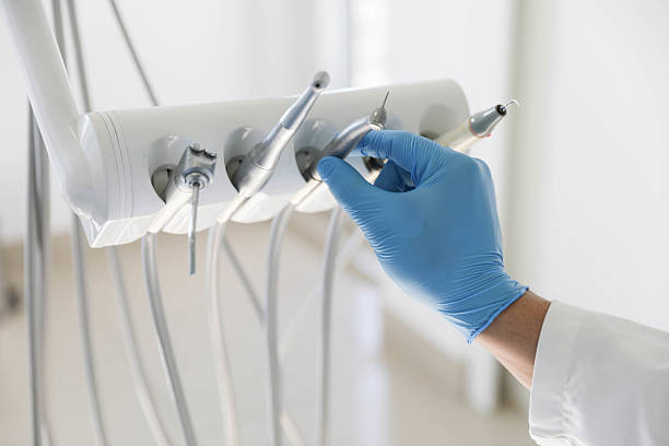 Professional Tooth Extraction technician working in English, IN
